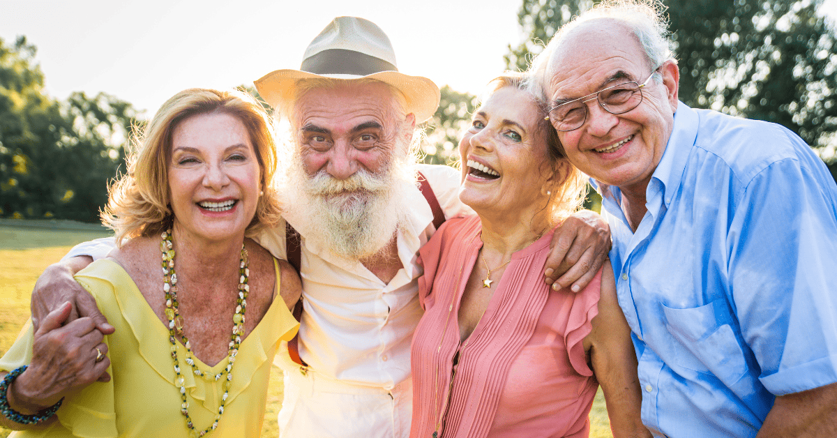 Family Involvement In Senior Living, Golden, Co 4 Seniors Hugging Outside