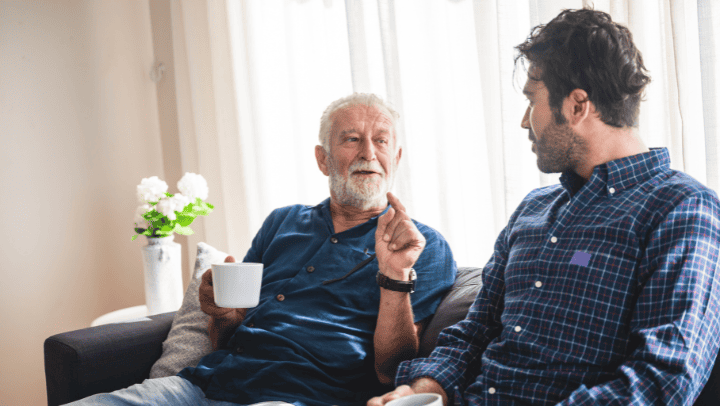 From Resistance To Relief: Your Parent'S Journey To Senior Living In Golden, Co 4 A Senior Man Having A Conversation With His Son
