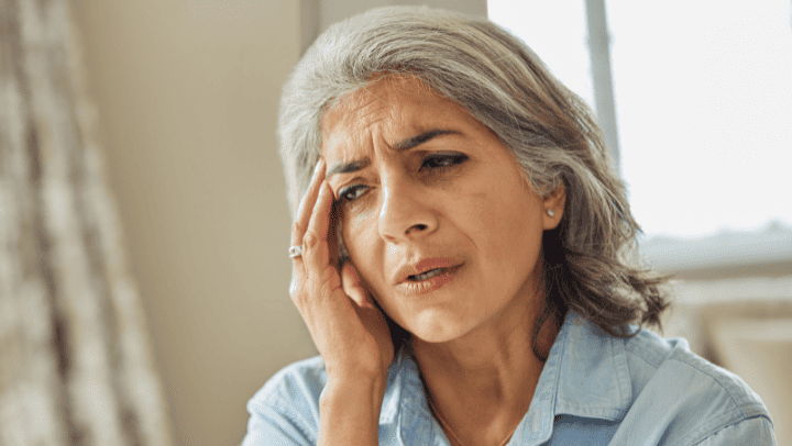 The Ultimate Nutrition Guide For Older Adults In Golden, Co 4 A Senior Lady Holding Her Head In Her Hands And Looking Pained